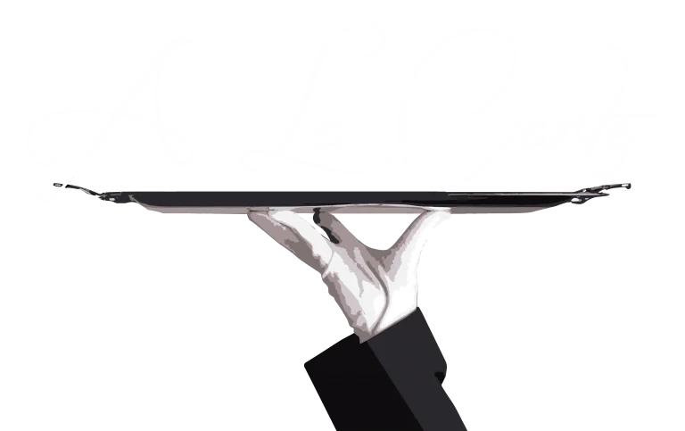 A gloved hand carrying a silver serving tray